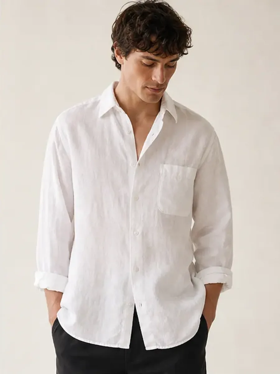 Relaxed white linen shirt on model